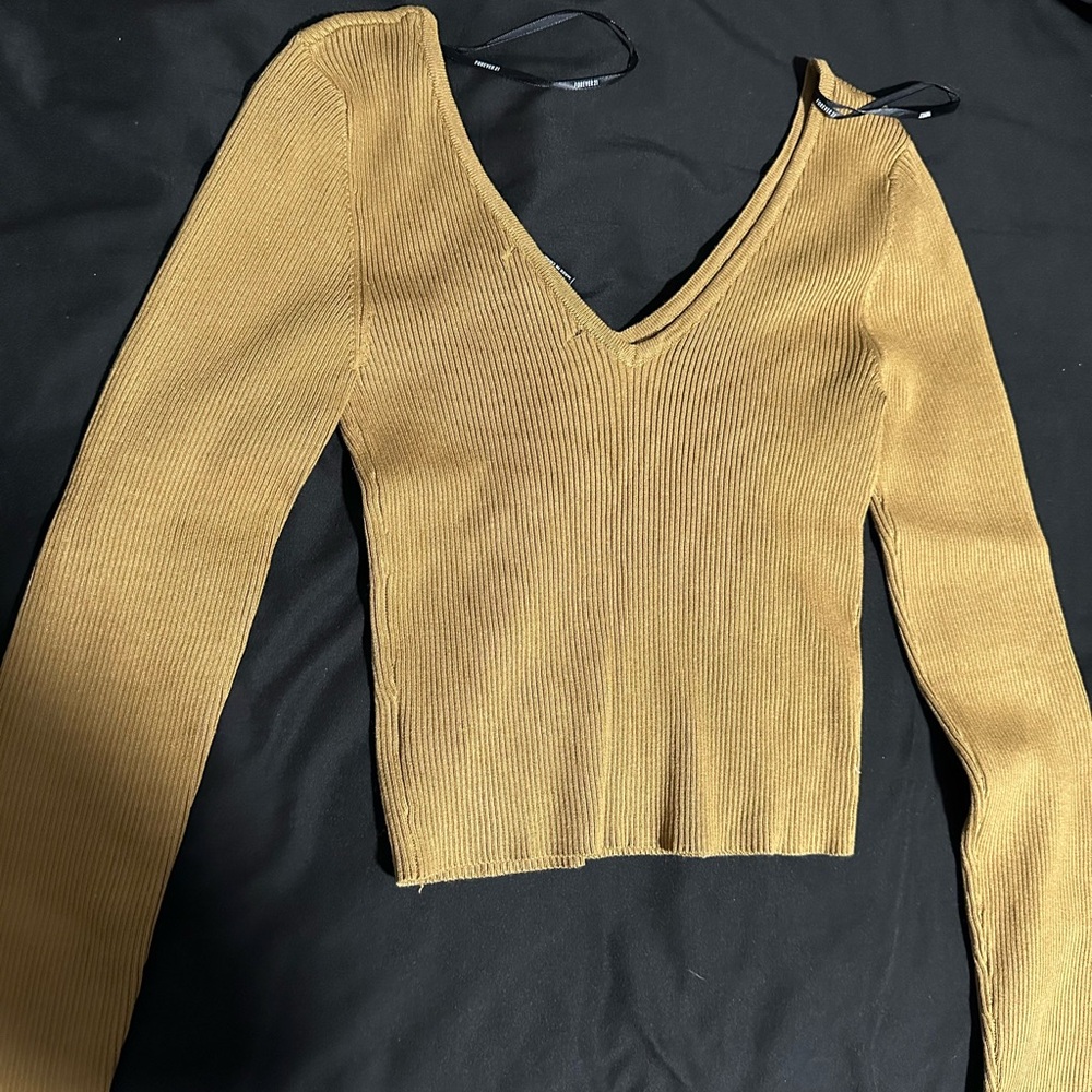 Gold long sleeve V-neck top